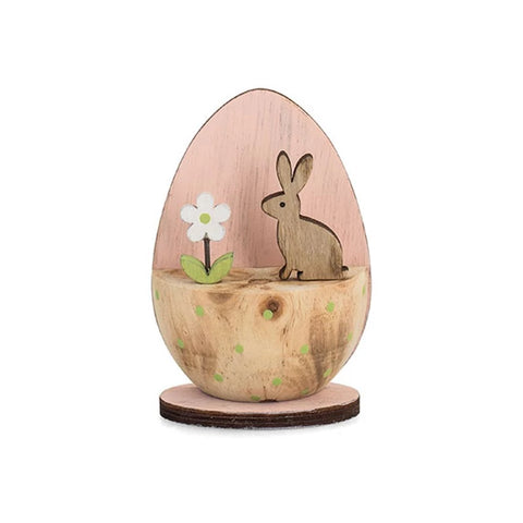 Uovo rosa in legno decorativo con coniglio e fiore